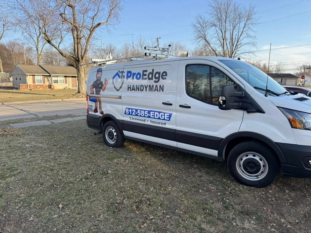 Handyman van parked in front of a home